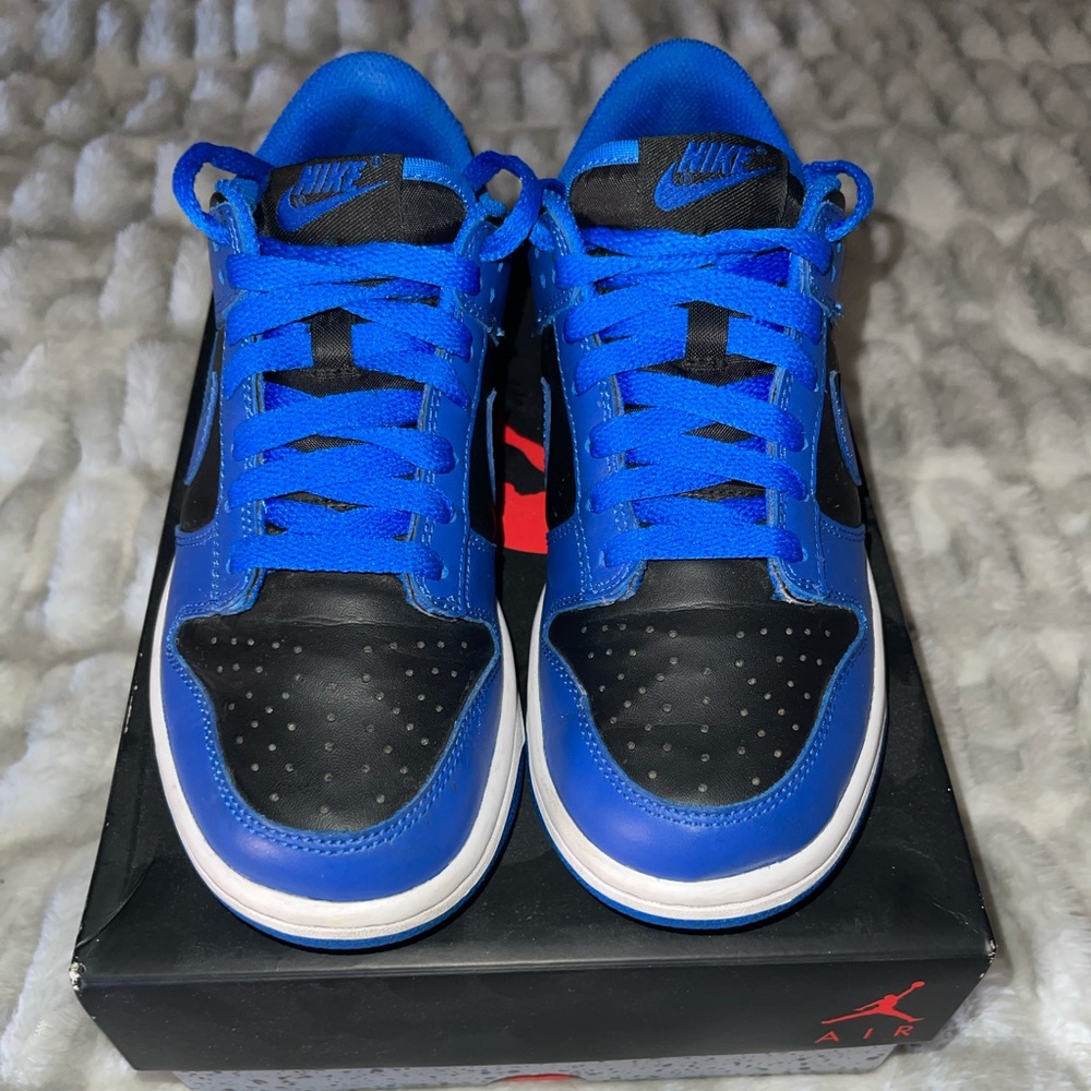 Black and blue Nike dunk lows